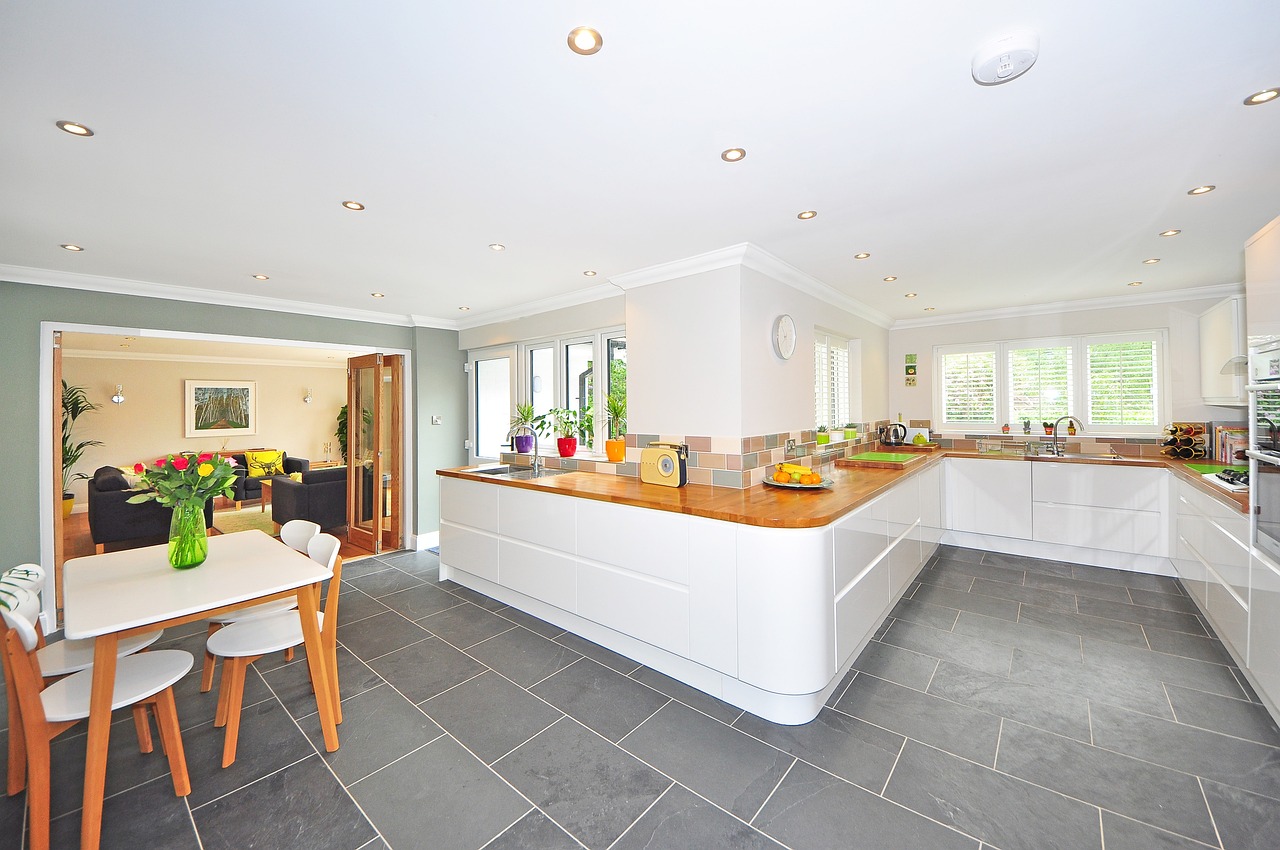 Interior of a kitchen with modern large format floor tiles